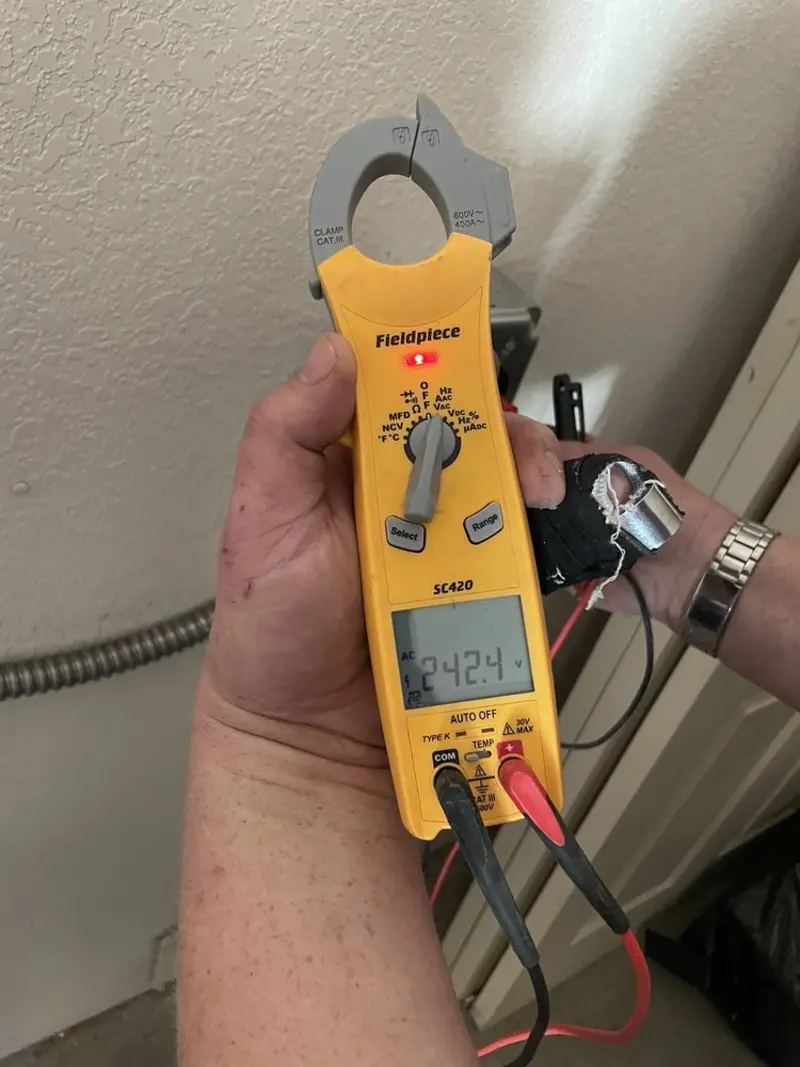 Voltage testing with clamp meter during Generator Installation in Fallsburg